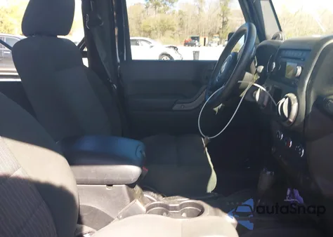 2011 Jeep Wrangler Sport z USA, uszkodzony, nr VIN 1J4AA2D11BL601512